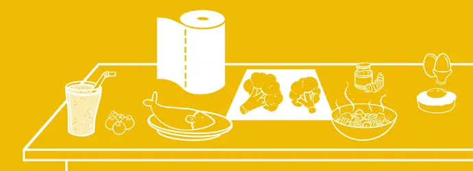 Illustration d’une table avec poisson, brocoli, pâtes, œufs, jus et essuie-tout sur fond jaune.