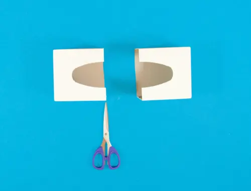 DIY pinata en carton recyclé, étape 2 : découper une boîte de mouchoir vide en deux